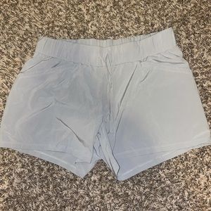 Grey athletic shorts with pockets + zipper pocket